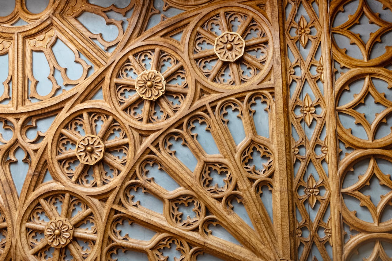 Detailed wooden decorations from Livraria Lello in Porto, showcasing ornate design.